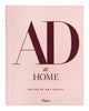 Book titled 'AD at Home' edited by Amy Astley on a pink background