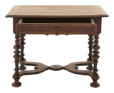 Wooden side table with a single drawer and decorative legs on a white background